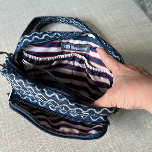 Lightly used Lug Carousel crossbody bag. Adjustable strap expands up to 26”. - Picture 3 of 6